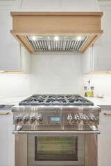 Stainless gas range in modern kitchen