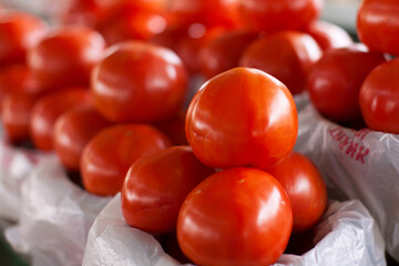 tomatoes at the market.