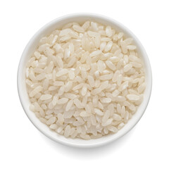 Uncooked dry rice in white bowl isolated on white. Top view.