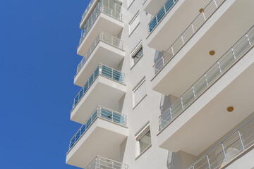 Residential apartment building. Blue sky.