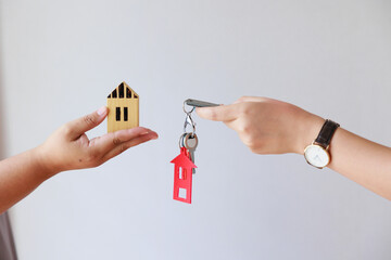 Key and house icon present exchange or contract to rent house or real estate or loan to buy a house.