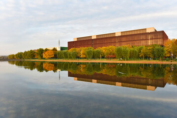 modern building with reflection in lake