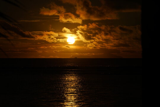 Sundowner with boat on LaDigue - Island 