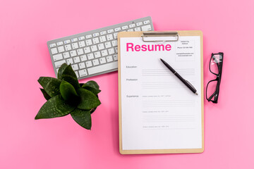 Searhing for a new job. Resume application form on office table
