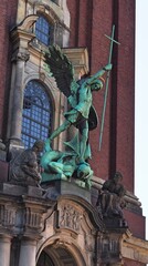 Fototapeta na wymiar The statue above the entrance at St. Michael's Main Church in Hamburg