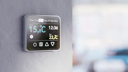 Room thermostat on wall - Low winter temperatures in homes caused by the energy crisis in Europe