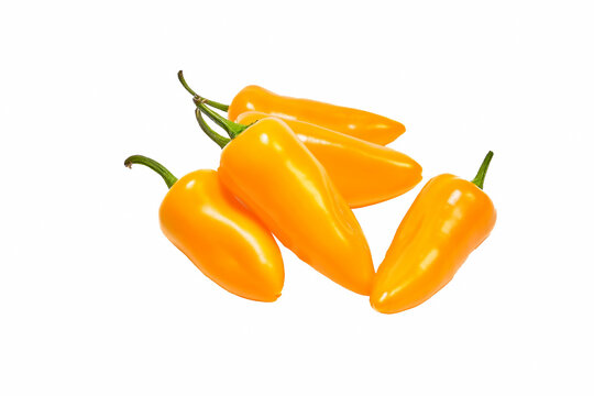 Group of yellow hot jalape o peppers isolated on a white background