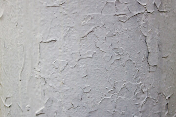 Old grey scratched wall texture for a background