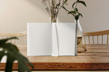Clean minimal Inner book 4x6 mockup on paper fold with dry plant