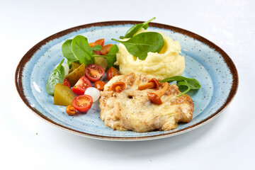 pork with mashed potato and vegetables