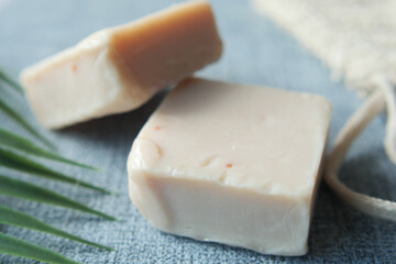 Homemade natural soap bar on black background 