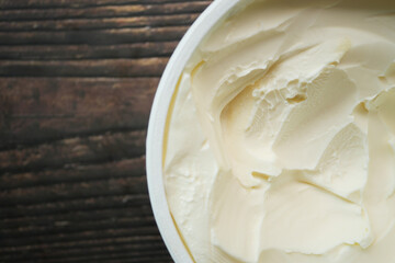 close up of fresh butter in a container 