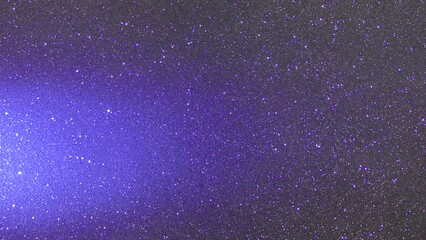 Horizontal beams of light of different colors flash in turn against a dark background.