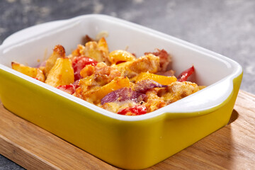 roasted vegetables with meat and cheese