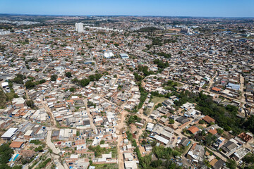 Aerial view of Parque Oziel neighborhood (also known as Jardim Monte Cristo) in Campinas, São Paulo. Poor community with wooden houses, garbage and vegetation in its surroundings.