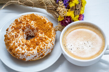 cup of coffee and donuts