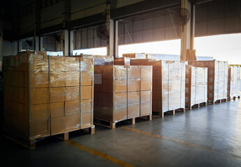 Packaging Boxes Wrapped Plastic Stacked on Pallets. Storage Warehouse. Cartons, Cardboard Boxes. Supply Chain. Storehouse Distribution. Cargo Shipping Warehouse Logistics.