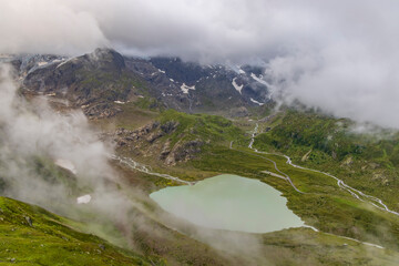 Typical alpine landscape of Swiss Alps with Steinsee, Urner Alps, Canton of Bern, Switzerland