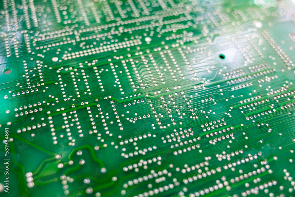 Poster old computer chips that are out of order. not working microshops with transistors, chips and conduct