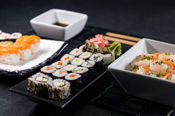 Various dishes of Asian cuisine with typical sushi