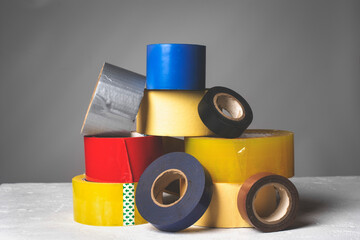Rolls of adhesive tape in different colors.