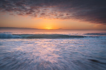 Fototapeta na wymiar Sunset over the sea in Big Sur, California