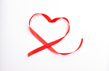 Happy Valentines Day. Red Ribbon Heart on white background. Valentines Day concept