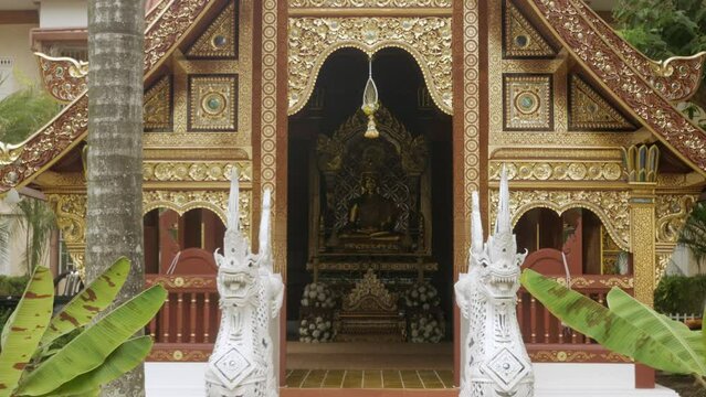 beautiful building view inside of Wat Phra Singha temple with gorgeous Lanna Architecture. Southeast asia life in Chiang Mai,Thailand.