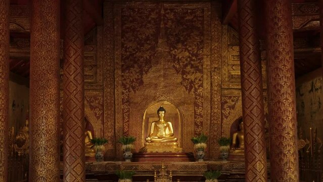 beautiful golden budha statue of Phra Singha inside Wat Phra Singha temple. Southeast asia life in Chiang Mai,Thailand.