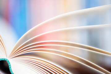 Soft blurred background, close-up of opened book pages