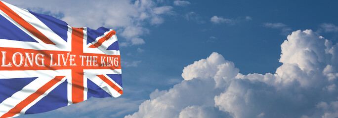 Long live the king text on British flag background.