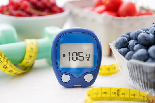 Glucometer with sugar level, diabetes concept