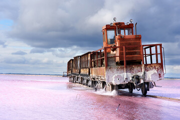 lake Burlin Altai. Old train rides on the railway laid in the water through the salt lake. train...