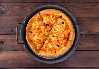 pizza on a wooden table