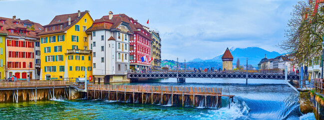 Panoramic view on Altstadt district and medieval wooden Needle Dam of Reuss river in Lucerne,...