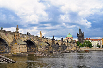 Fototapeta na wymiar Charles bridge over Vltava river in Prague Czech republic