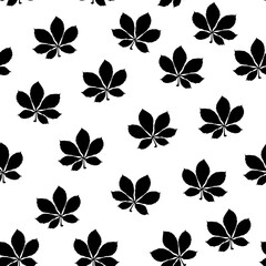 Seamless pattern of silhouettes of leaves on a white background. Black and white background