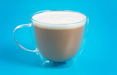 Latte in a Double Walled Tumbler on a Bright Background