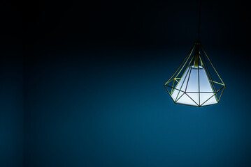 A small lamp in a dim corner.