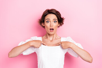 Photo of shocked impressed girl dressed white top open mouth pointing fingers herself isolated pink color background - obrazy, fototapety, plakaty