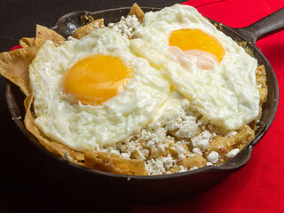 fried eggs in a pan