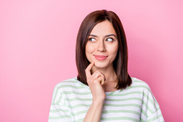 Closeup photo of young adorable funny girl touch finger cheeks minded dreamy look empty space think...