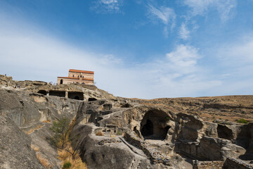 Uplistsikhe cave town near Gori city in Georgia. Ancient cave city Uplistsikhe in Georgia, UNESCO site. Natural wonder landscape in Georgia