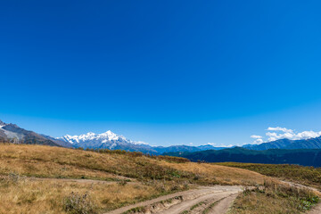 Mountain hiking landscape in Mestia, Svaneti region in Georgia.  mountain landscape around Koruldi lakes area with snow in Caucasus