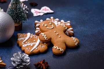 Christmas composition with gingerbread cookies, Christmas toys, pine cones and spices