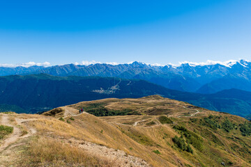 Mountain hiking landscape in Mestia, Svaneti region in Georgia. Drone like footage of mountain landscape around Koruldi lakes area with snow in Caucasus