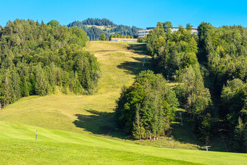 Piste and golf course on the on the Obersalzberg in the Berchtesgaden Alps. The Obersalzberg belongs to the Kehlstein mountain and is part of the market town of Berchtesgaden