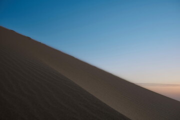Fototapeta na wymiar View of the Sarykum dune in summer in Dagestan