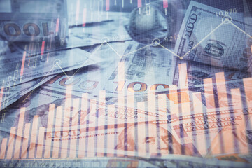 Multi exposure of forex chart drawing over us dollars bill background. Concept of financial success...