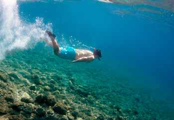 Boy snorkeling in the sea.